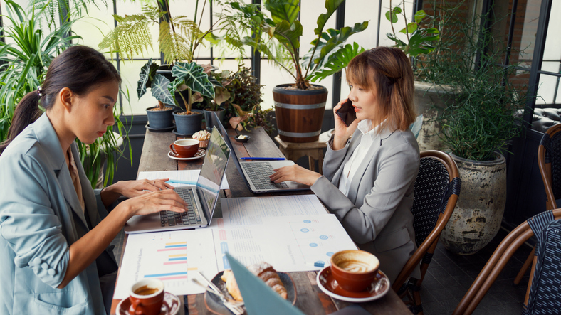 Financial advisors reviewing tax strategies for clients.
