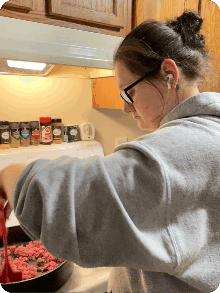 Bibb cooks dinner for her kids.